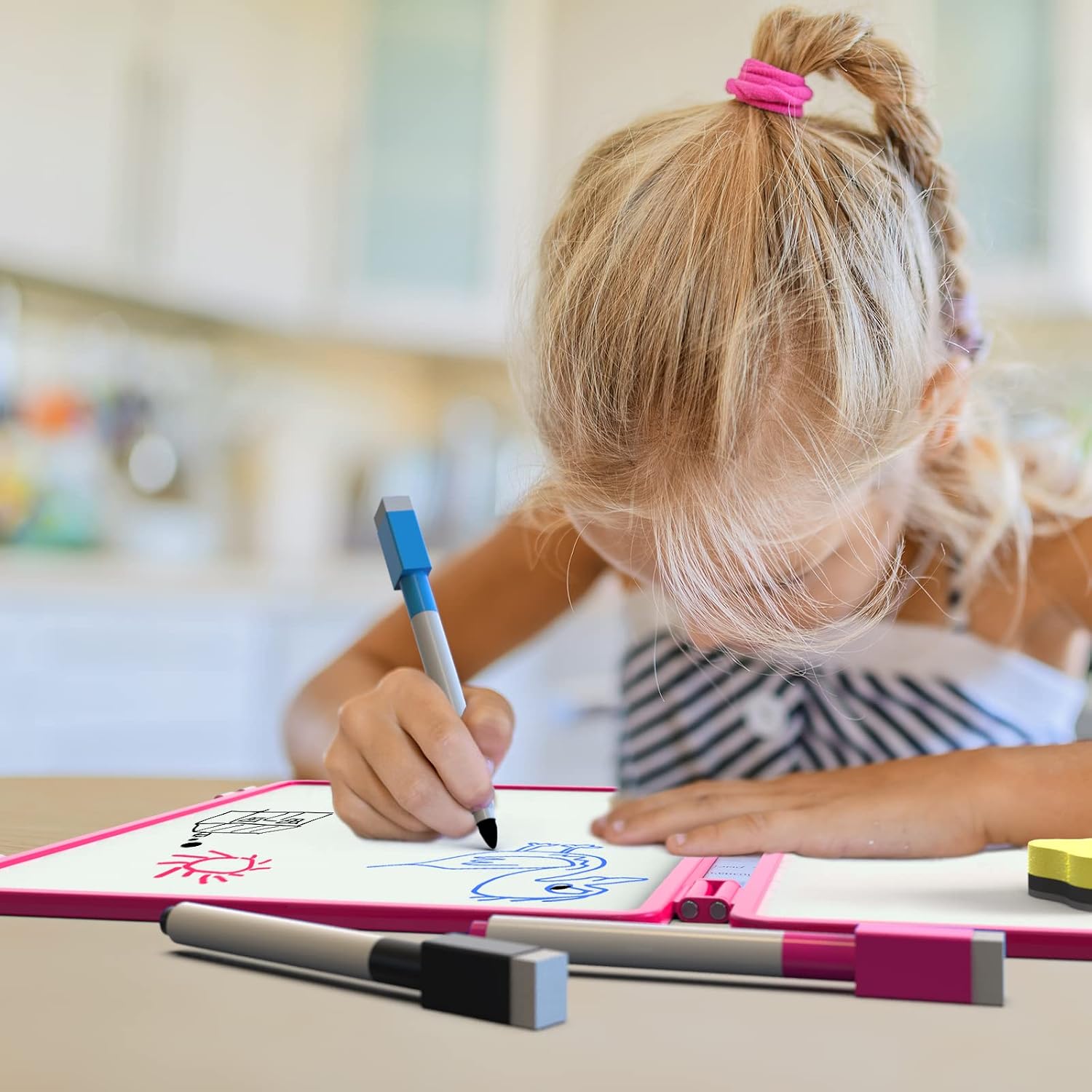 HOME EDUCATION: Drawing, letter practice and shared learning at home.